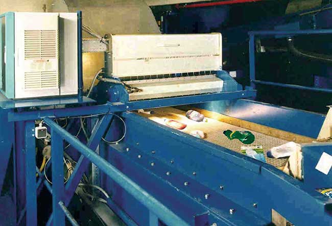  A sorting machine for plastic bottles samples spectra from multiple fiber optic ports across the conveyor belt to sort plastic bottles by type.
