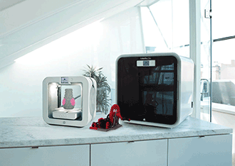 The new Cube 3D printer and the CubePro Duo 3D personal printer, both from 3D Systems.