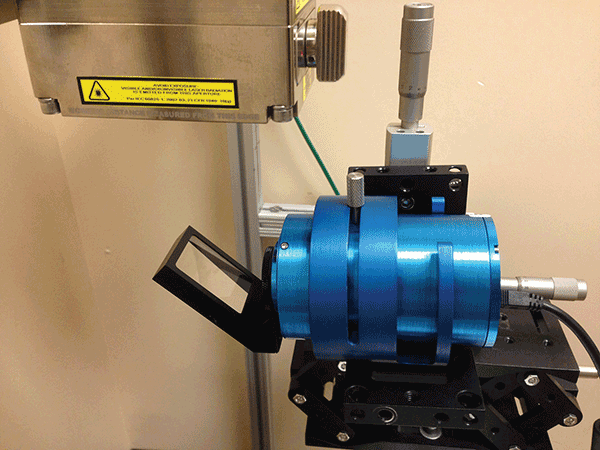 A scanning slit beam profiling system with a beam sampling optic taking measurement on a multikilowatt fiber laser used for welding.