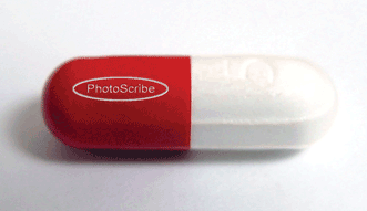 A laser-inscribed bicolor pill demonstrating automated inscription placement using color recognition with machine vision. 