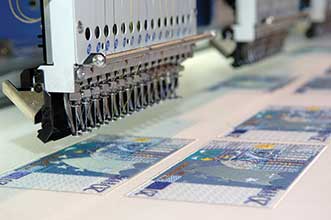 In some instances, such as for the security features on currency, UV or infrared light is used as part of the inspection process.