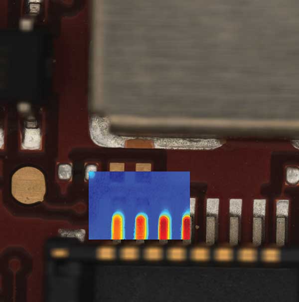 Color image with pseudo-color overlay showing solder joints on a printed circuit board (PCB).