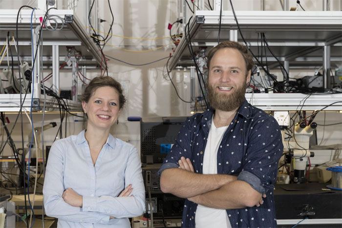 Researchers Birgit Stiller (left) and Moritz Merklein in their laboratory in the University of Sydney Nanoscience Hub.