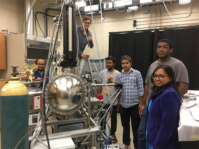 Madhab Neupane and his research team with the in-house ARPES system. From left to right: Gyanendra Dhakal (graduate student), Klauss Dimitri (undergraduate student), Md Mofazzel Hosen (graduate student), Madhab Neupane, Christopher Sims (graduate student), Firoza Kabir (graduate student). Courtesy of University of Central Florida.