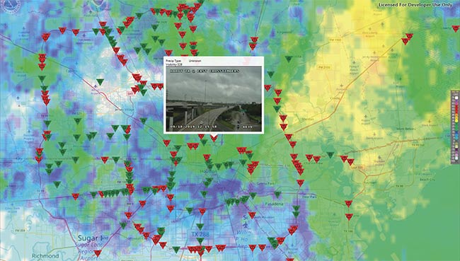 A screenshot from a demo application built around SwRI’s ActiveVision showing live data from Houston at around 2 p.m. on Sept. 18, when the city was dealing with Tropical Storm Imelda. The red triangles are cameras where inclement weather was detected. The radar overlay shows that detections match live weather reports, proving that existing video/still camera infrastructure can aid traffic management by automatically spotting weather conditions and potentially other problems. Courtesy of SwRI. 