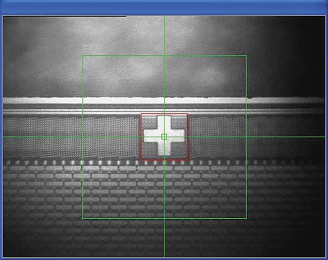 A clear, crisp cross fiducial is critical to optical component alignment. Fiducials that are difficult to see or find cost extra time and resources during the assembly phase. Courtesy of Palomar Technologies.