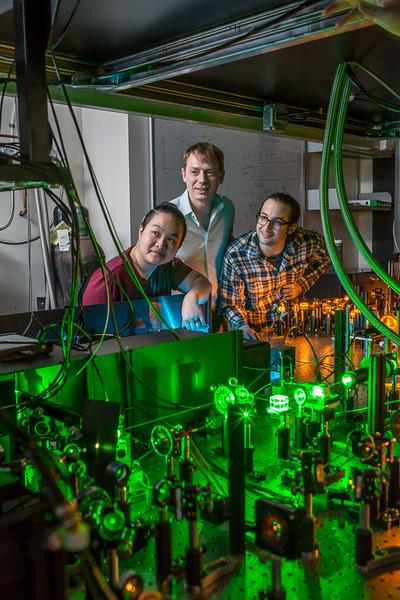 Tzu-Yung Huang, Lee Bassett and David Hopper at work in Bassett’s Quantum Engineering Laboratory. Courtesy of the University of Pennsylvania.