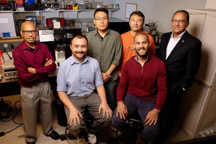 The research team includes, from (l): professor Taher Saif, graduate student Onur Aydin, graduate student Xiastian Zhang, professor Mattia Gazzola, graduate student Gelson J. Pagan-Diaz, seated, and professor and dean of the Grainger College of Engineering, Rashid Bashir. Courtesy of L. Brian Stauffer. University of Illinois/biohybrid robots propelled by muscle tissue, nerve cells.