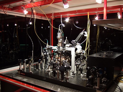 Fourteen Entangled Photons Expel a Quantum Computing Bottleneck