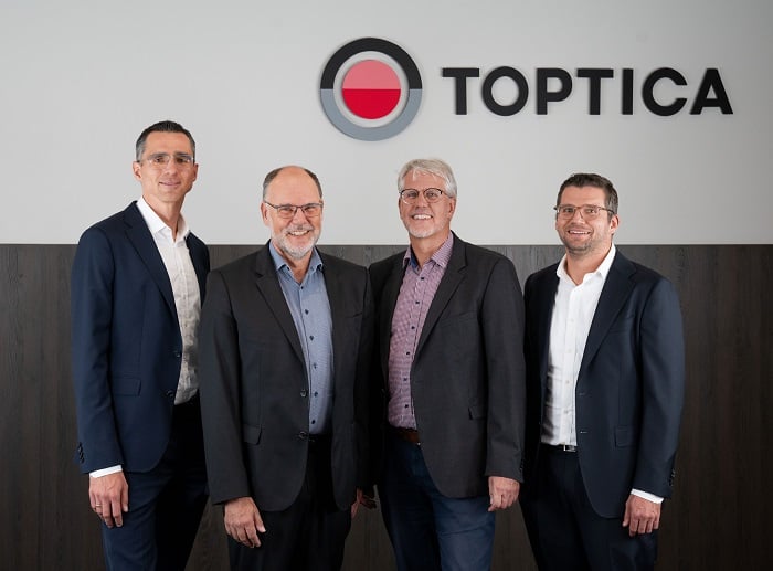 (From left) Mathias Schindler, TOPTICA CSO Thomas Renner, TOPTICA founder and CTO Wilhelm Kaenders, and Fabian Uhl. Courtesy of TOPTICA Photonics.