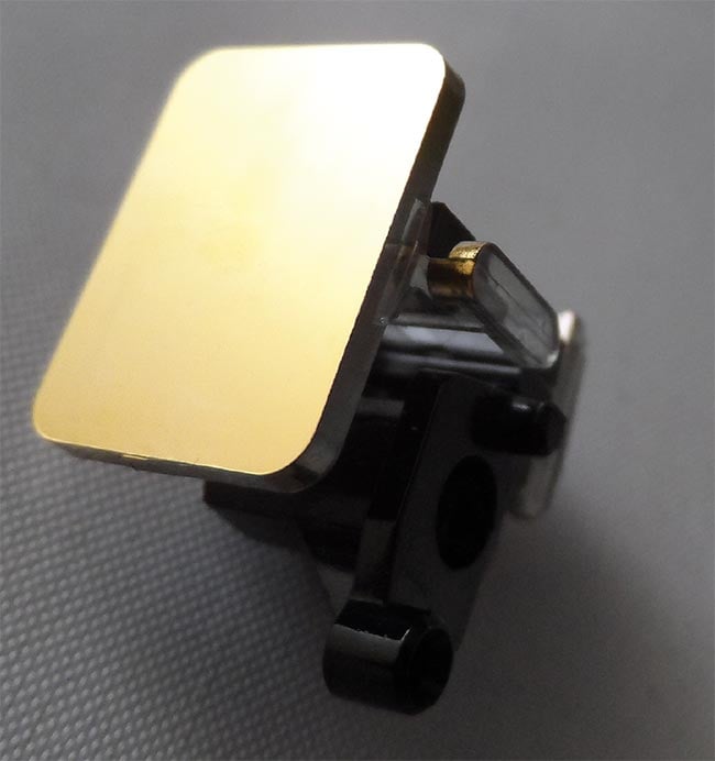 Gold, shown here protected on polycarbonate, is an excellent reflector in the infrared spectrum. The material does not perform as well in the low-visible and UV wavelengths. Courtesy of NACL.