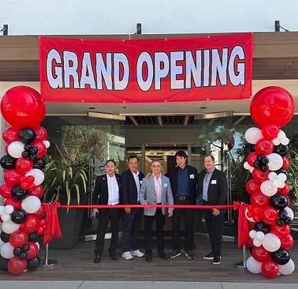 Members of the OptoSigma board and executive team at the new facility’s ribbon cutting ceremony. Courtesy of OptoSigma Corporation. 