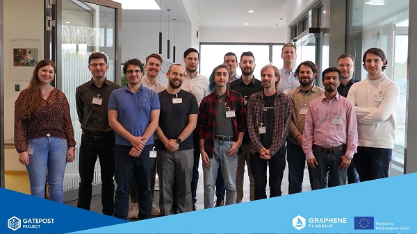 Members of the Horizon Europe-funded GATEPOST project presented the first graphene photonic integrated photonic chip produced by the three year project. Courtesy of Graphene Flagship.