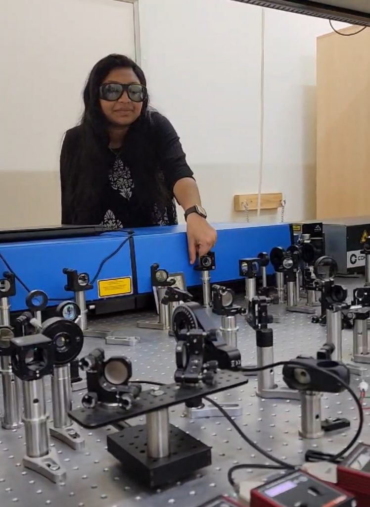 Researcher Jyothsna K. Manattayil aligns optical beams for up-conversion experiments. Courtesy of Harinee Natarajan.