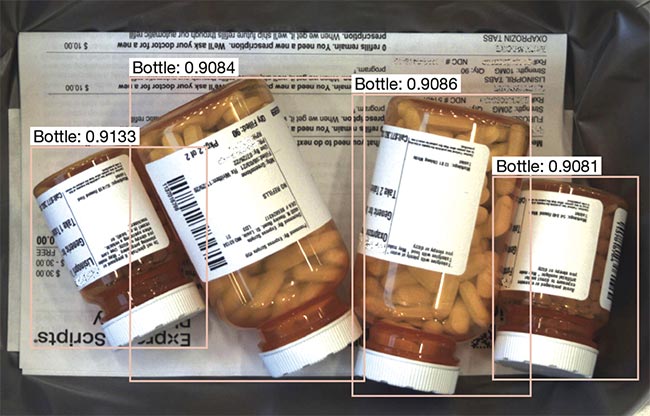 An AI object detection algorithm identifying bottles of different sizes and shapes inside a package before shipment. Courtesy of Teledyne DALSA.