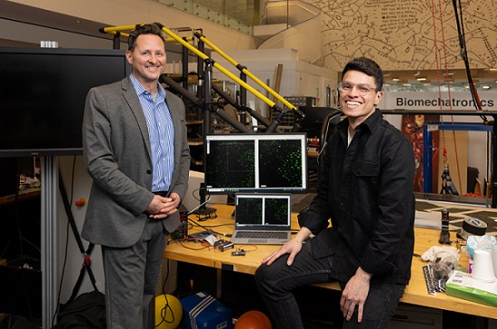 Professor Hugh Herr (left) and researcher Guillermo Herrara-Arcos (right) developed a minimally invasive strategy, based on optogenetics, that could transform clinical care for persons suffering from limb pathology. Courtesy of Steph Stevens/MIT.