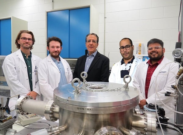 Professor My Ali El Khakani of INRS (center) and his research team. The team, along with another from UPJV, found that thick MoS2 films exhibit strong optoelectronic properties when their layers are vertically aligned. Courtesy of INRS.