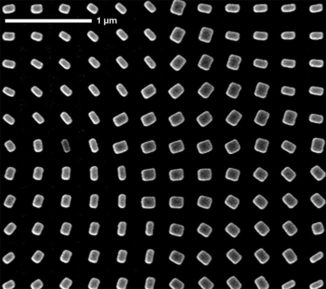 The micrograph section (top) shows a metasurface consisting of titanium dioxide nano-fins with a height of 600 nm. They are tiny waveguides (magnified, bottom) that exhibit structural birefringence due to their anisotropy. Visible light polarized along the short and long sides sees a different effective refractive index. A periodic array of this metasurface, combined with a lens and a CMOS sensor, forms an ultracompact single-shot polarization-sensitive camera capable of capturing, point by point, the polarization of a scene, including elliptical polarization. Courtesy of Harvard University/Federico Capasso and Noah Rubin.