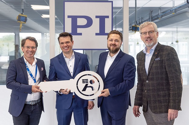 PI executives at the new production facility’s opening. Courtesy of PI.