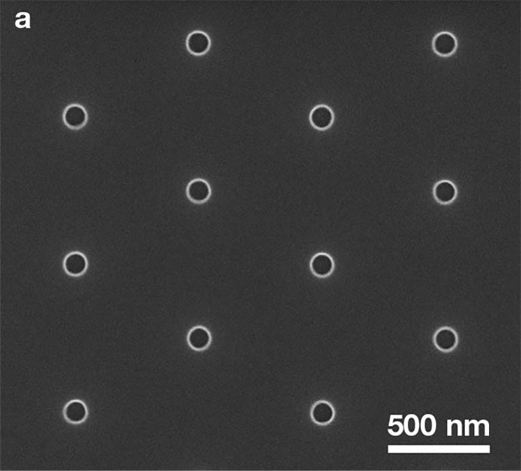 Figure 4. Representative microscopy images of 2D periodic patterns fabricated using DTL. Circular holes in a hexagonal lattice (a). Circular holes in a square lattice (b). A double-hole square lattice (c). Images (a) and (c) are adapted with permission from Reference 4. Courtesy of Eulitha AG.