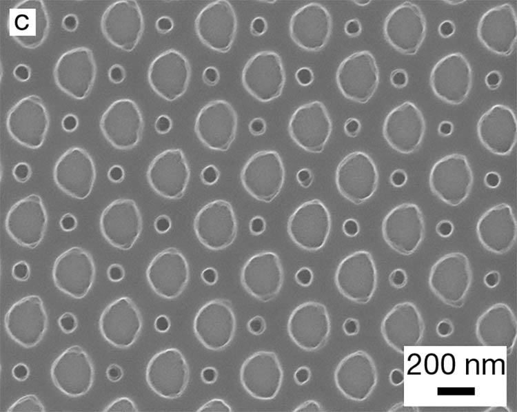 Figure 4. Representative microscopy images of 2D periodic patterns fabricated using DTL. Circular holes in a hexagonal lattice (a). Circular holes in a square lattice (b). A double-hole square lattice (c). Images (a) and (c) are adapted with permission from Reference 4. Courtesy of Eulitha AG.