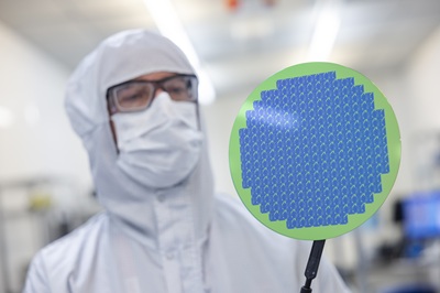 Handling a 200 mm wafer in Micronova at VTT. Courtesy of VTT.