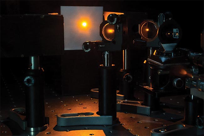 The emergence of krypton lasers in the 1970s offered yellow laser lines. Technological developments in metal vapor lasing and, particularly, neutral copper vapor lasers, yielded strong emission at 578 nm — also in the yellow. In 2020, researchers at the Physical Research Laboratory at Gujarat University developed a compact, tunable, and ultrafast high-power yellow laser. Supported applications include those in biomedical and full-color video projection. See Reference 2. Courtesy of Varun Sharma.