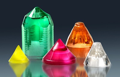 Various oxide laser crystals with different active dopants. Courtesy of Fraunhofer.