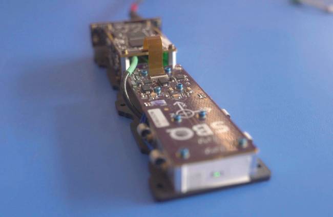 A portable quantum diamond magnetometer. The product achieves room-temperature operation and robust performance in a compact design form factor, optimizing its performance even in magnetically noisy environments. Courtesy of SBQuantum.