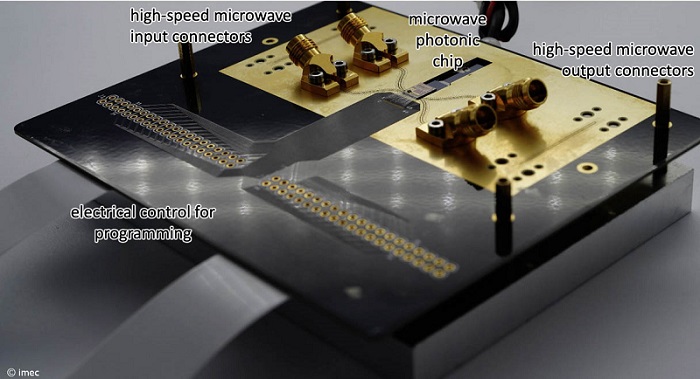 Packaged microwave photonic chip, with two high-speed inputs and two outputs, and control wires for programming the filter response and the input-output connections. The fiber array has not yet been connected in this picture. Courtesy of imec.