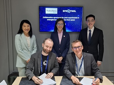 SpeQtral and Thales Alenia Space leaders sign the cooperation agreement. Courtesy of Thales Alenia Space.