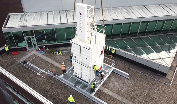Figure 5. Radar installation on the University of Birmingham campus. The ultrastable microwave system is located in the lower radar cabin. Courtesy of University of Birmingham.